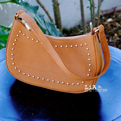 LiA Hoi An's Studded Shoulder Bag and Hand Bag
